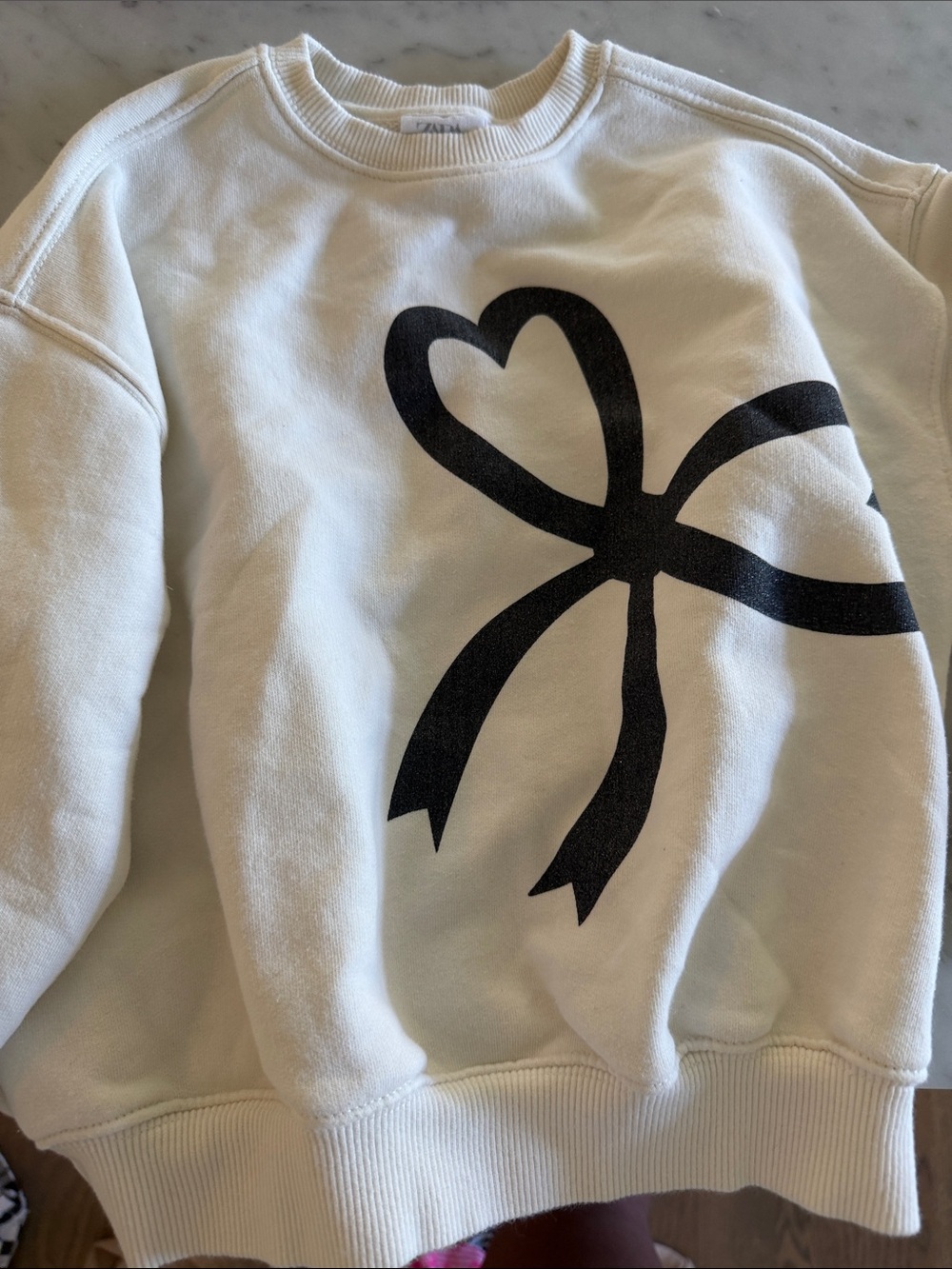 Zara White Sweatshirt with Black Bow Graphic
